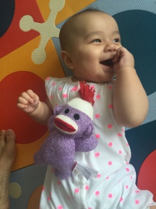 Verity is happy to be playing with purple monkey!